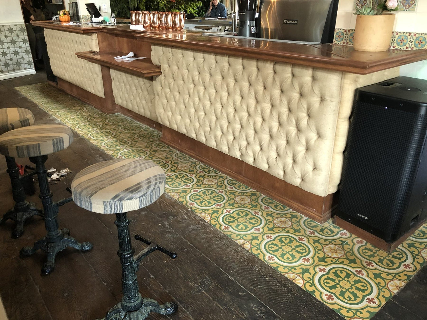 Commercial upholstery work on a bar face, Los Angeles