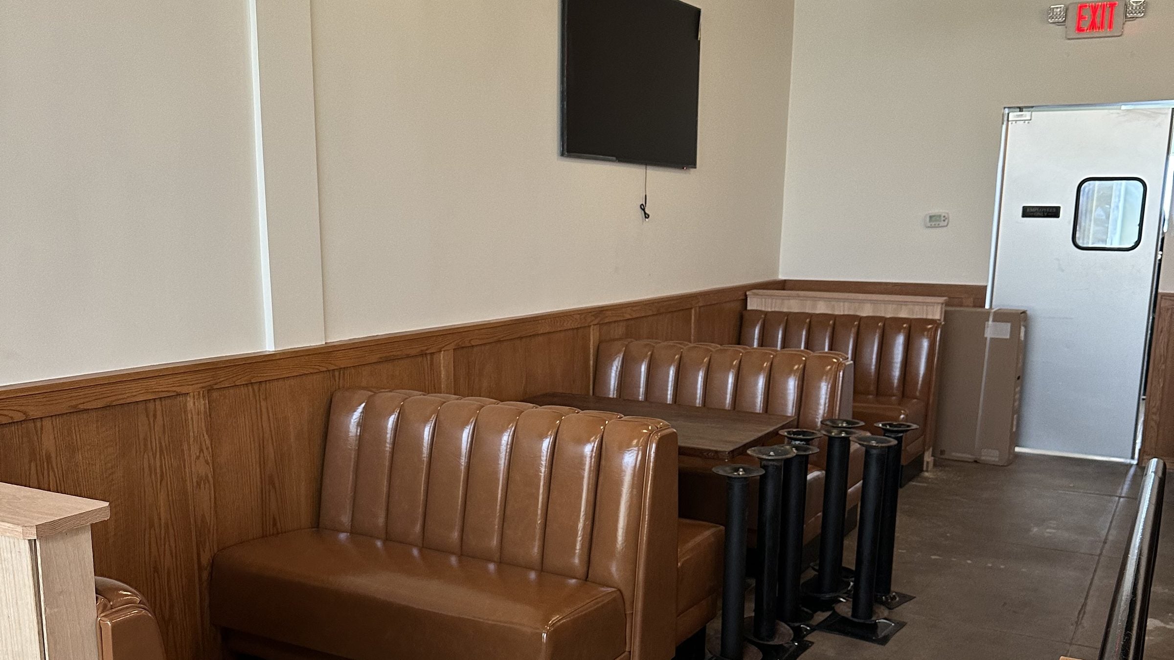Row of custom channel-back restaurant booths built by Danny's Restaurant Furniture, Los Angeles